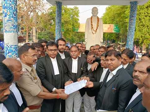 A new black or copper coloured statue of Ambedkar should be installed