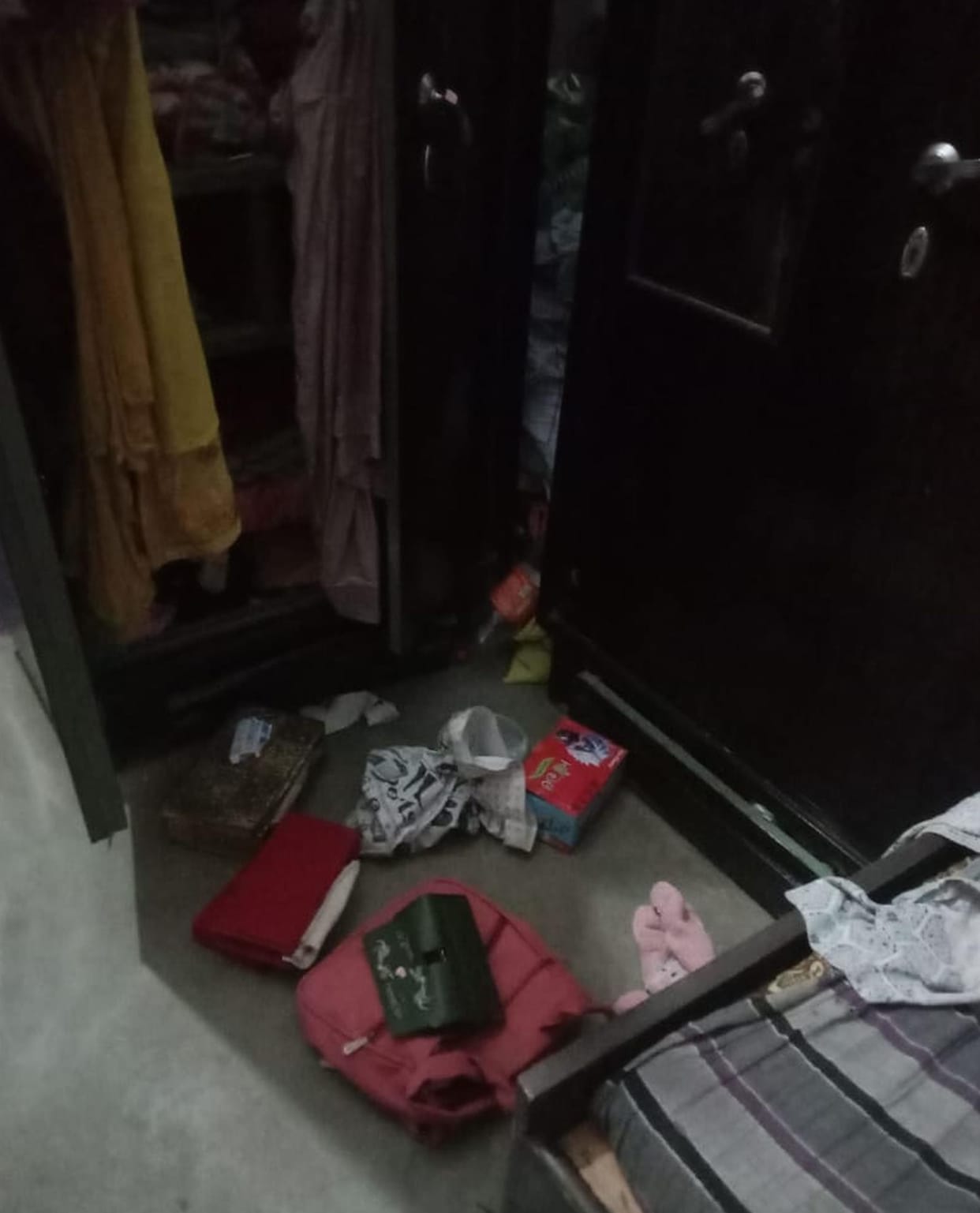 Thieves broke into two houses built side by side and stole cash and jewellery