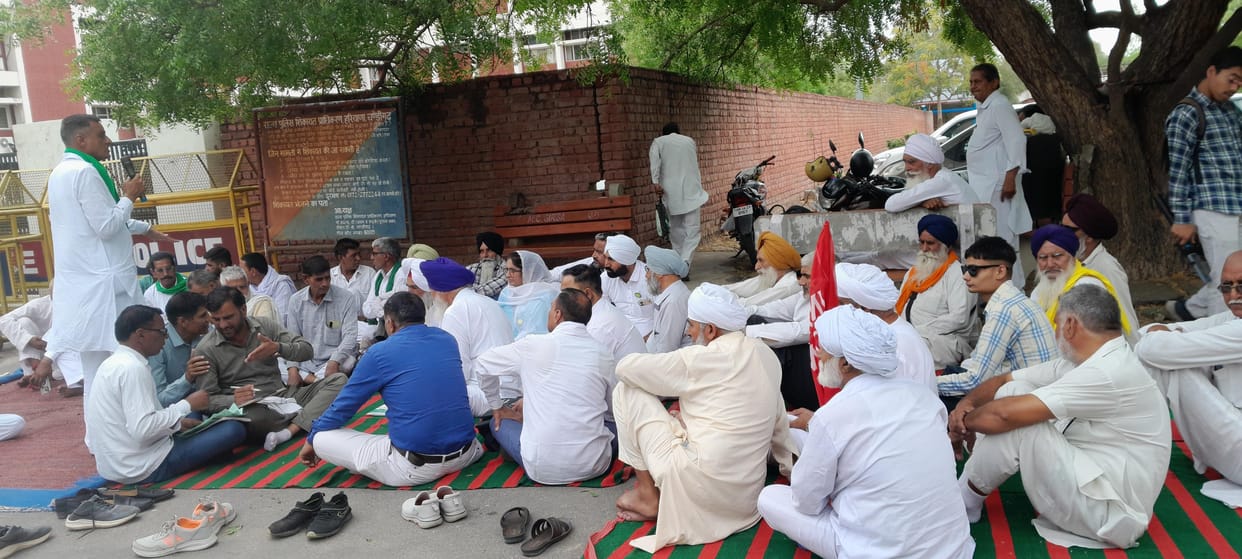 Demanding release of water in canals, farmers staged a sit-in protest at the Mini Secretariat
