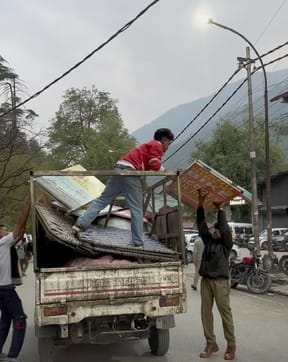 The items displayed on the sidewalk were confiscated, and the nagarpalika workers also took away the hawkers