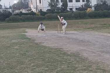 The sports school team won the match by four wickets