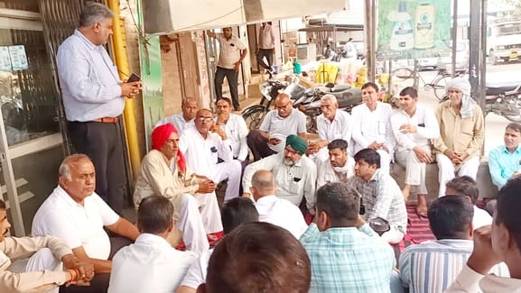 DM and traders face to face over keeping rain-soaked wheat in the warehouse