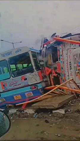 Truck rammed into a bus which went out of control due to waterlogging on the highway