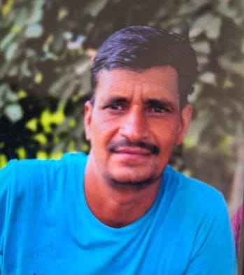 The watchman who was opening the gate died after being hit by a school bus.