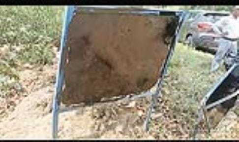 Villagers. got angry. breaking. signboard. smearing. soot.