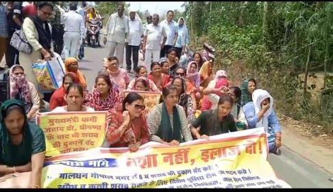 Villagers. angry. after. breaking. signboard. smearing.