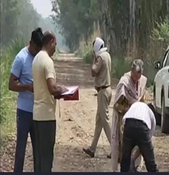Police investigating the body found in the canal.