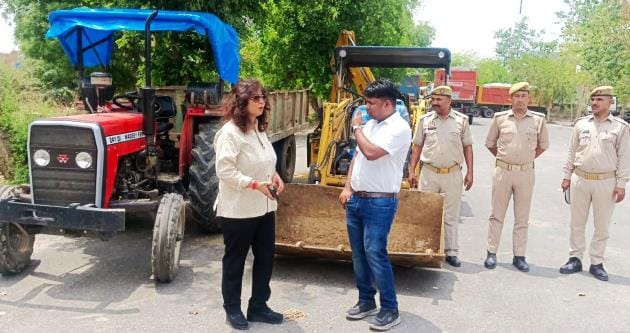Loader tractor doing illegal mining and tractor-trolley filled with soil seized