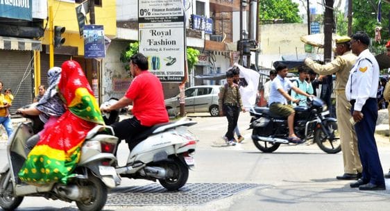 Carelessness: Every minute 10 bike riders pass by without helmet