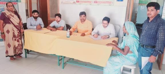 Long queue of patients suffering from fever, cough, headache and stomachache
