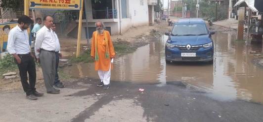 Due to three hours of rain, PHC premises, roads were flooded and the security wall built on the river bank collapsed
