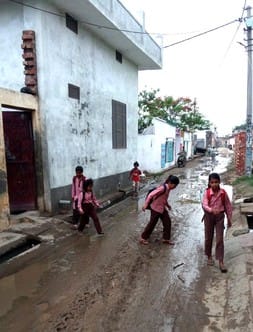 After the rain, the broken road turned into mud, making it difficult to walk