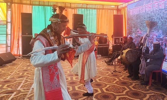 Sainj Mela... Men wearing chola-cap danced with swords