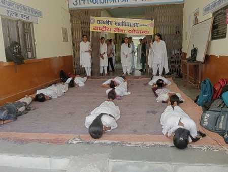 As soon as the siren sounded, the students lay down on the ground and hid under chairs and tables