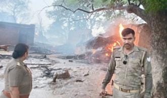Six huts caught fire, two cattle died