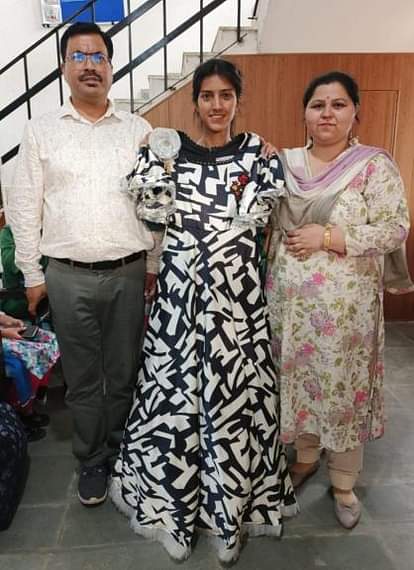 Hina stood first in the state level dress making competition