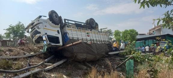 After getting stuck in the wires, the DCM overturned after hitting the pole