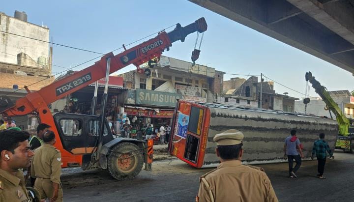 The bus steering failed, collided with four vehicles and overturned, nine injured