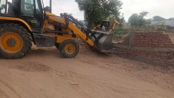 Bulldozer run on construction in illegal colony