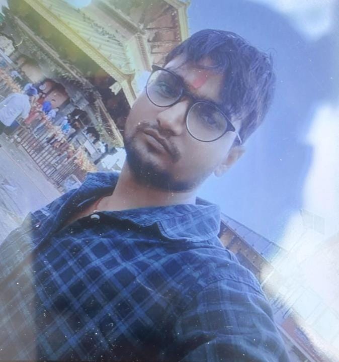 The body of a young man was found hanging from a sari noose in the room