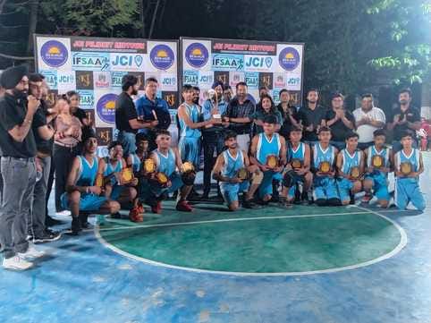 Little Angels won the trophy by defeating Benhar School in basketball