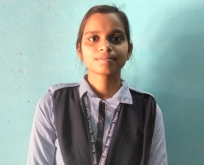 Neha brought laurels to her school by scoring 450 marks