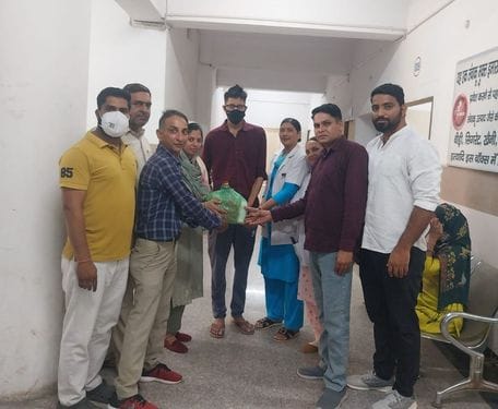 The head of the municipality adopted two TB patients