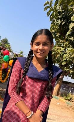 Komal got first place in the district with 476 marks in Arts stream