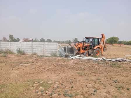 Bulldozer runs on illegal colony in Nandrampur Bas