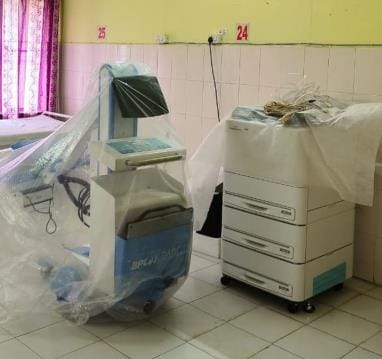 No X-ray technician, machine gathering dust
