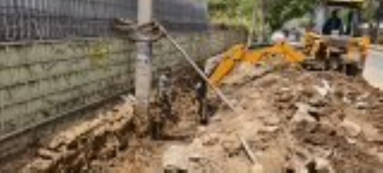 Delhi Road storm drain stuck in two departments
