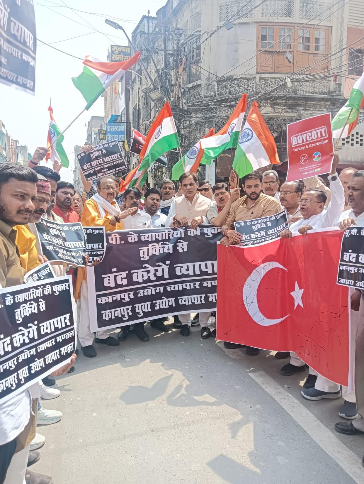 Officers and traders of Kanpur Udyog Vyapar Mandal demonstrating in P Road market.