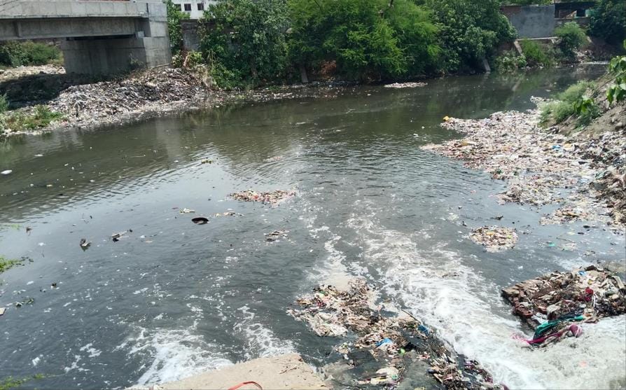 The corporation launched a campaign and removed garbage from the Dhamola river