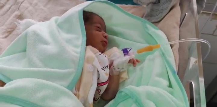 The condition of the newborn found in the hospital is improving