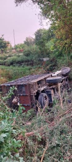 The pickup truck overturned after hitting a person