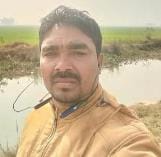 The body of a young man found soaked in blood on the roadside