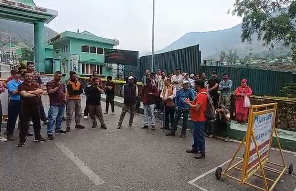 In Rampur, workers demonstrated near the power house gate of the project