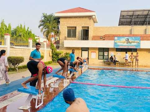 district level swimming competition next month