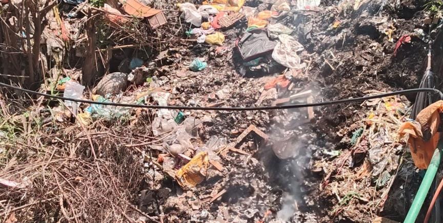 Garbage is being burnt in the open, people are suffocating