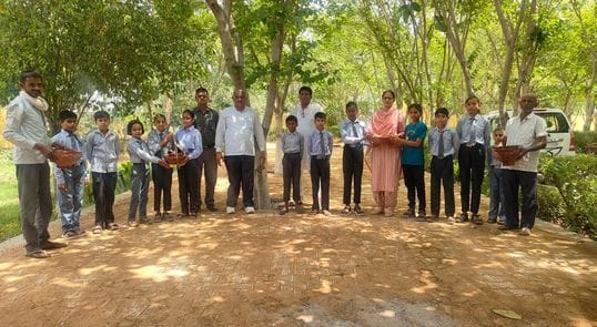 Students and teachers arranged water for the birds