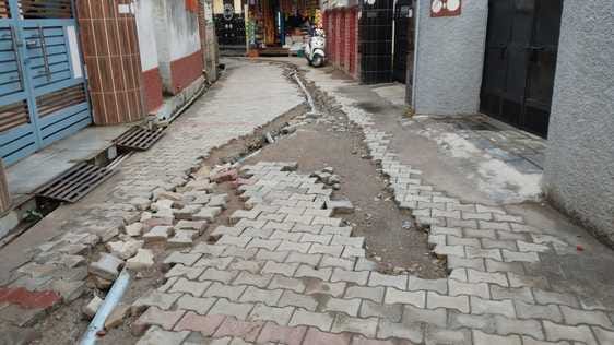 The dug up lane in ward number five and two has not been paved