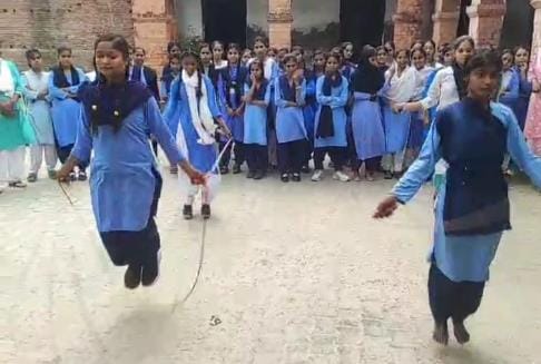 Yoga practice for children in summer camp