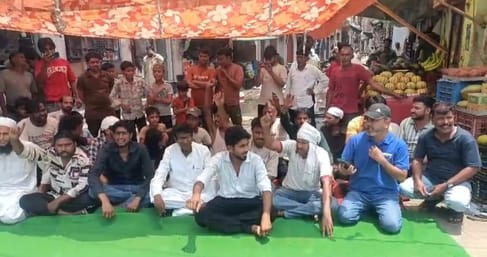 Councillors shouted slogans against the chairman over waterlogging on the road