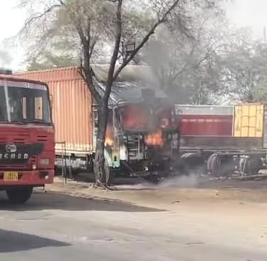 Due to extreme heat, a container parked on Alwar-Delhi road caught fire