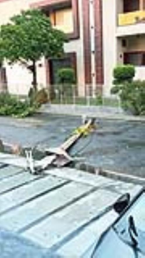 Trees and poles broken by a storm coming at a speed of 30 kilometers per hour, half the city submerged in darkness.