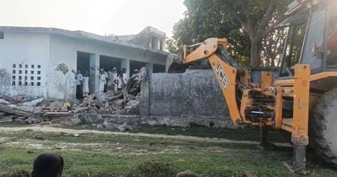 Bulldozer ran on the madrasa built in the barn