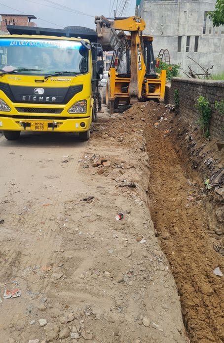 Work of digging drains started in Nerchowk market before rain