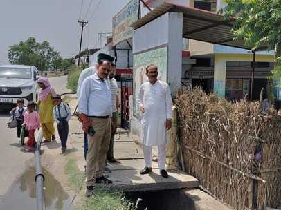 Cleaning of primary school Lal Singi surrounded by dirty water