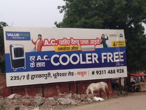 Illegal hoardings and banners have spoiled the city's appearance