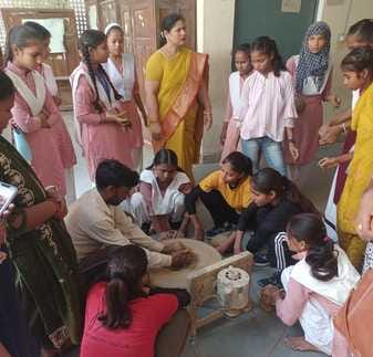 Summer Camp: Children made flower rangoli and clay pots